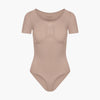 Body reductor moldeador estilo camiseta con corte slip