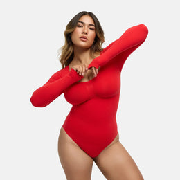 Body reductor moldeador de manga larga con braguita
