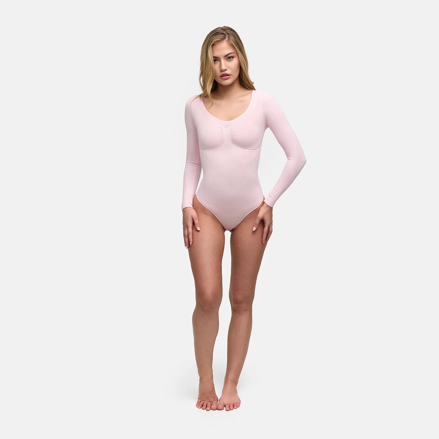 Long-sleeve sculpting bodysuit with built-in briefs