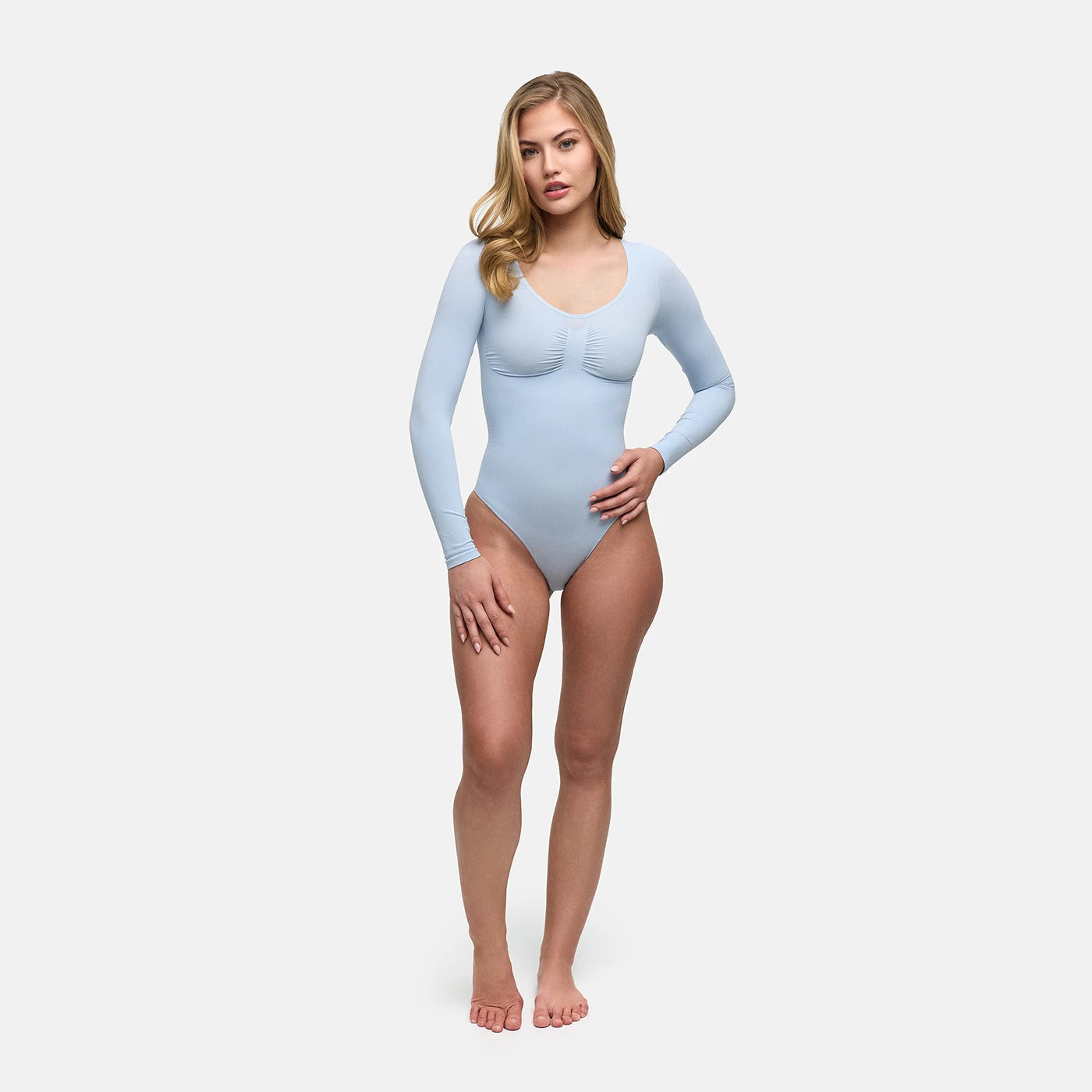 Long-sleeve sculpting bodysuit with built-in briefs