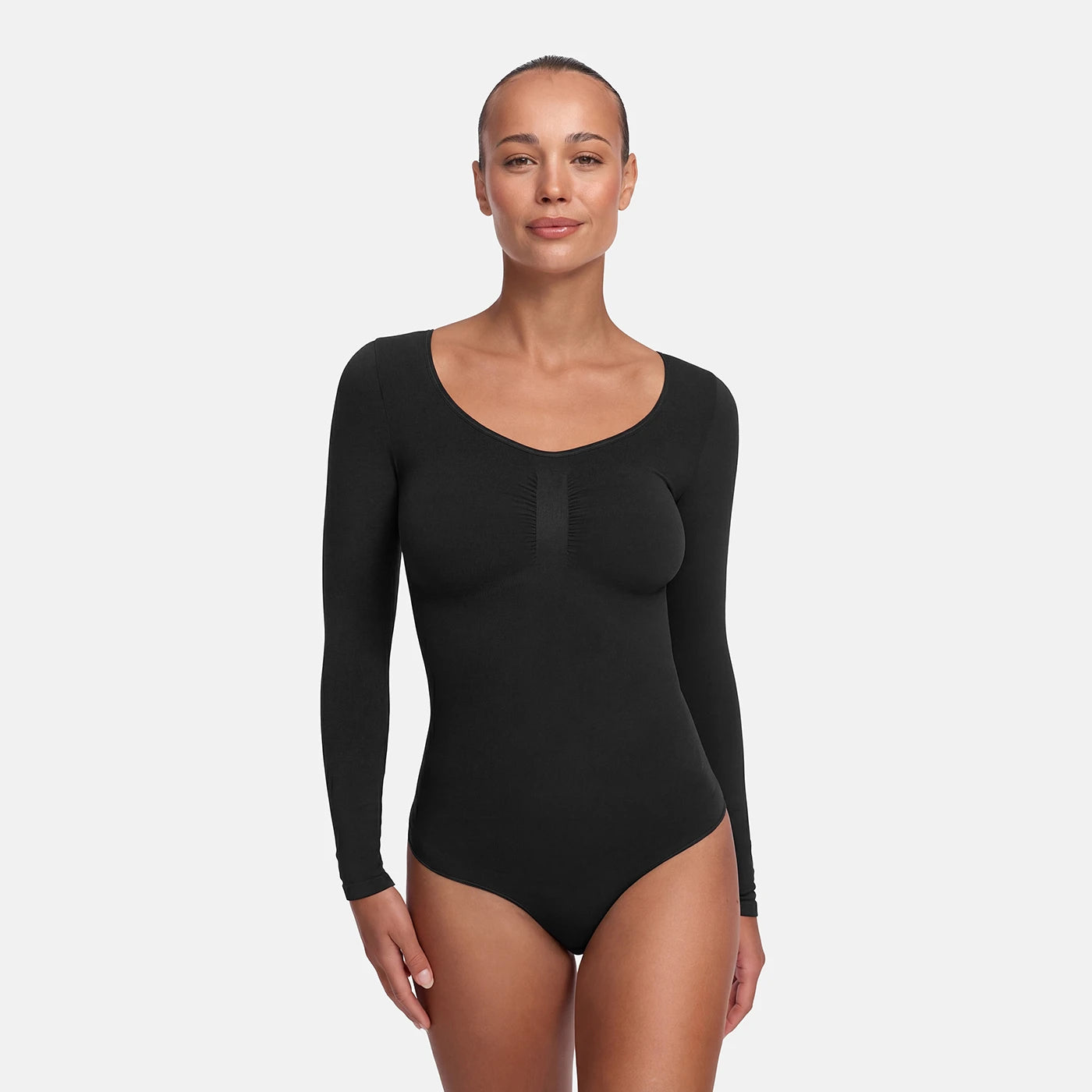 Bodysuit formende shapewear med lange ærmer og snøre