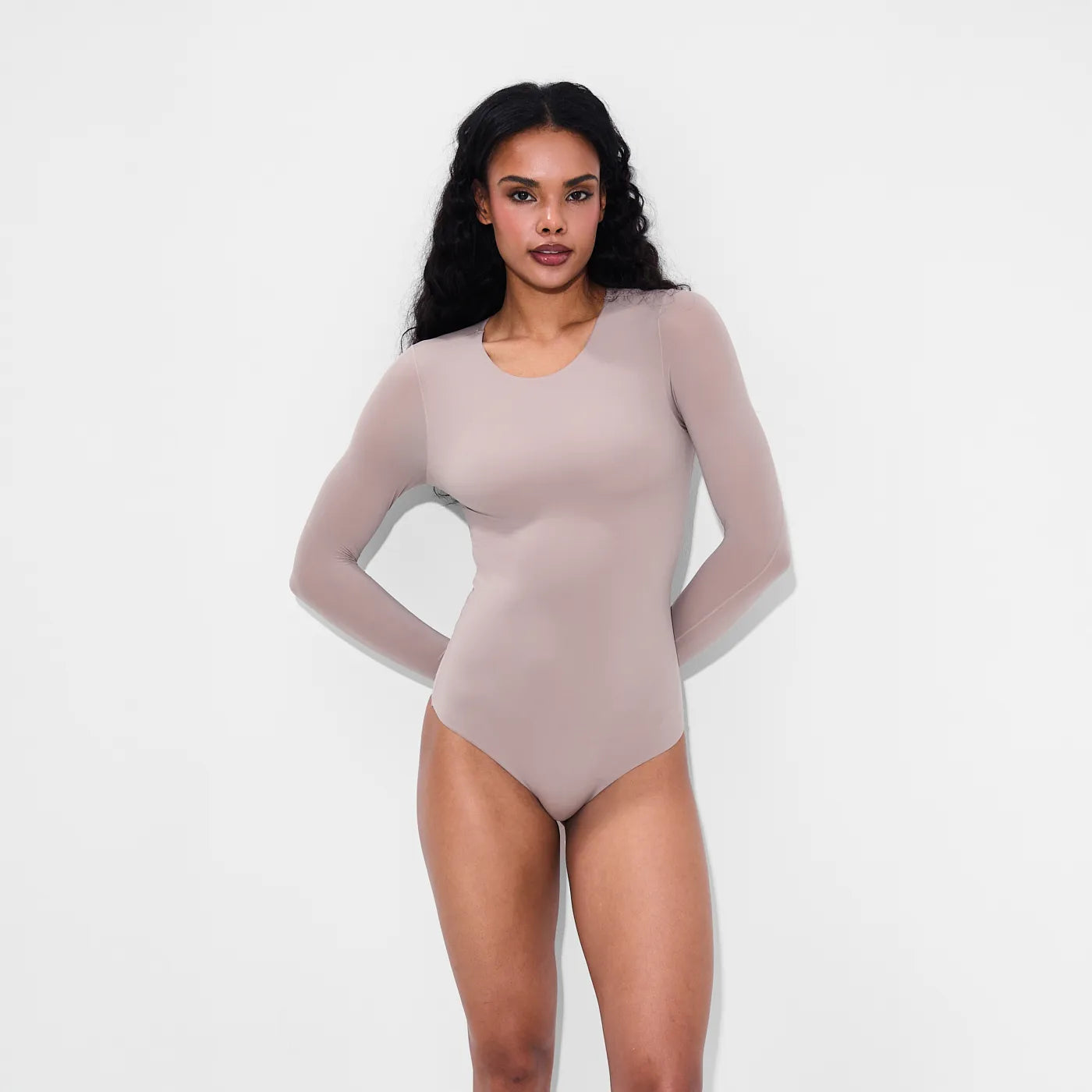 Långärmad bodysuit med rund halsringning